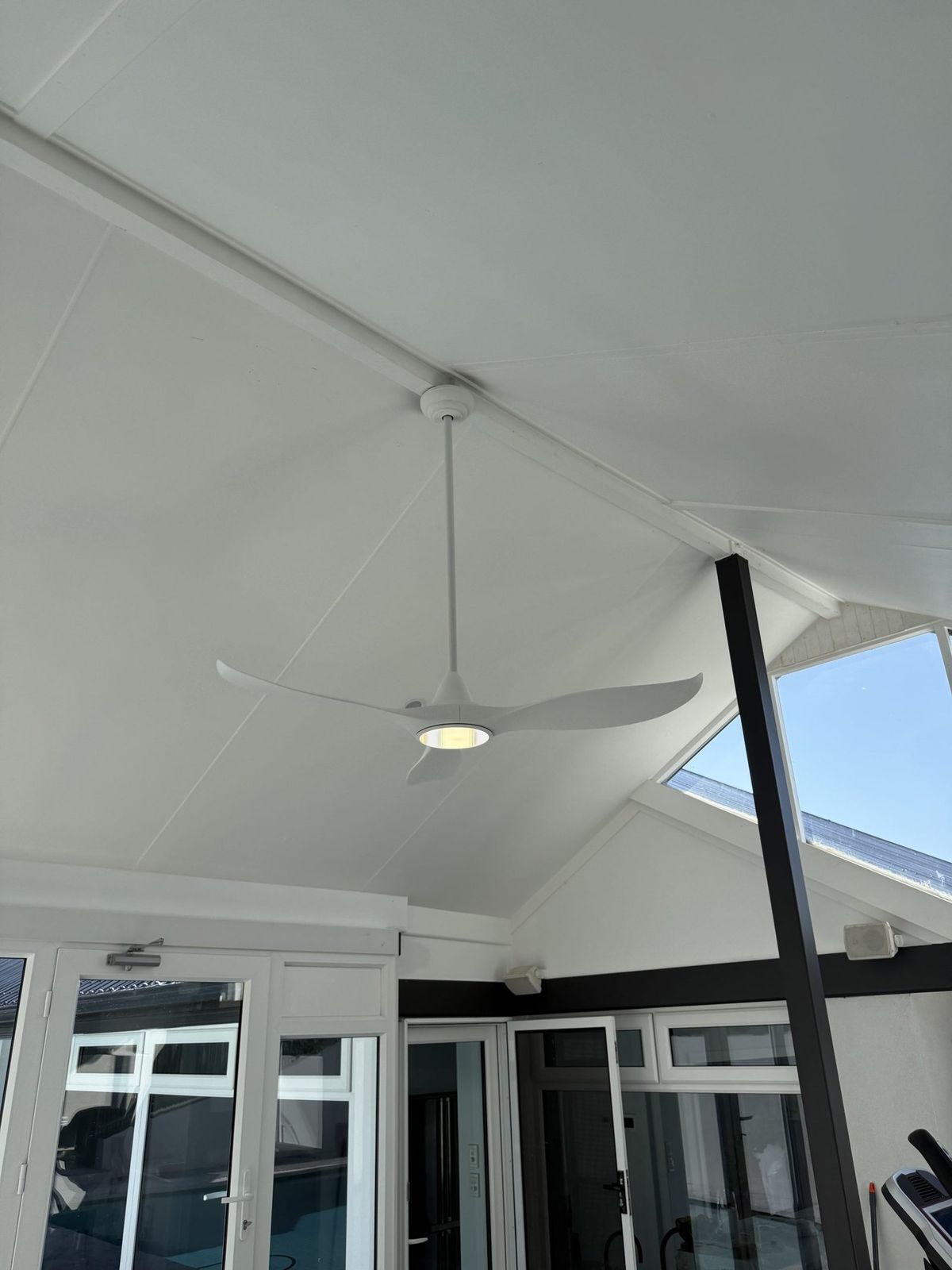 Ceiling fan installed in a covered outdoor area